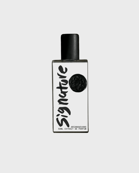 Perfume bottle labeled 'Signature' on a white background. Best niche perfume